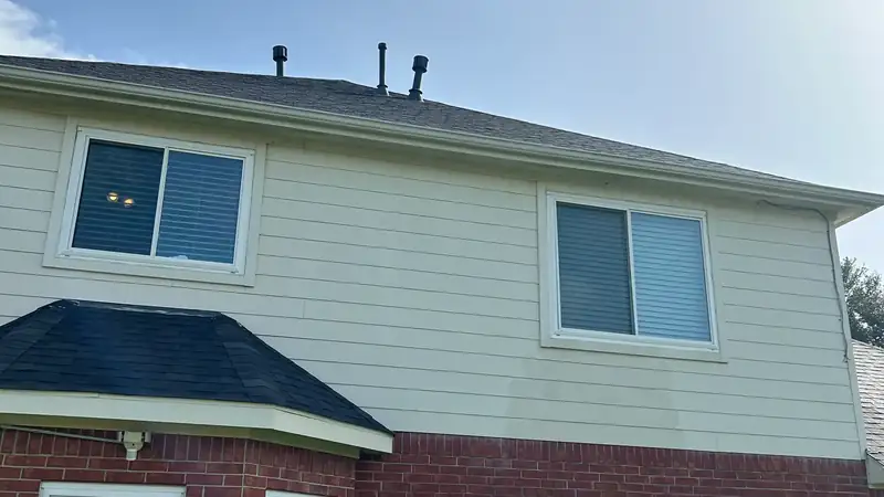 Gutter corner and roof edge on a two-story home